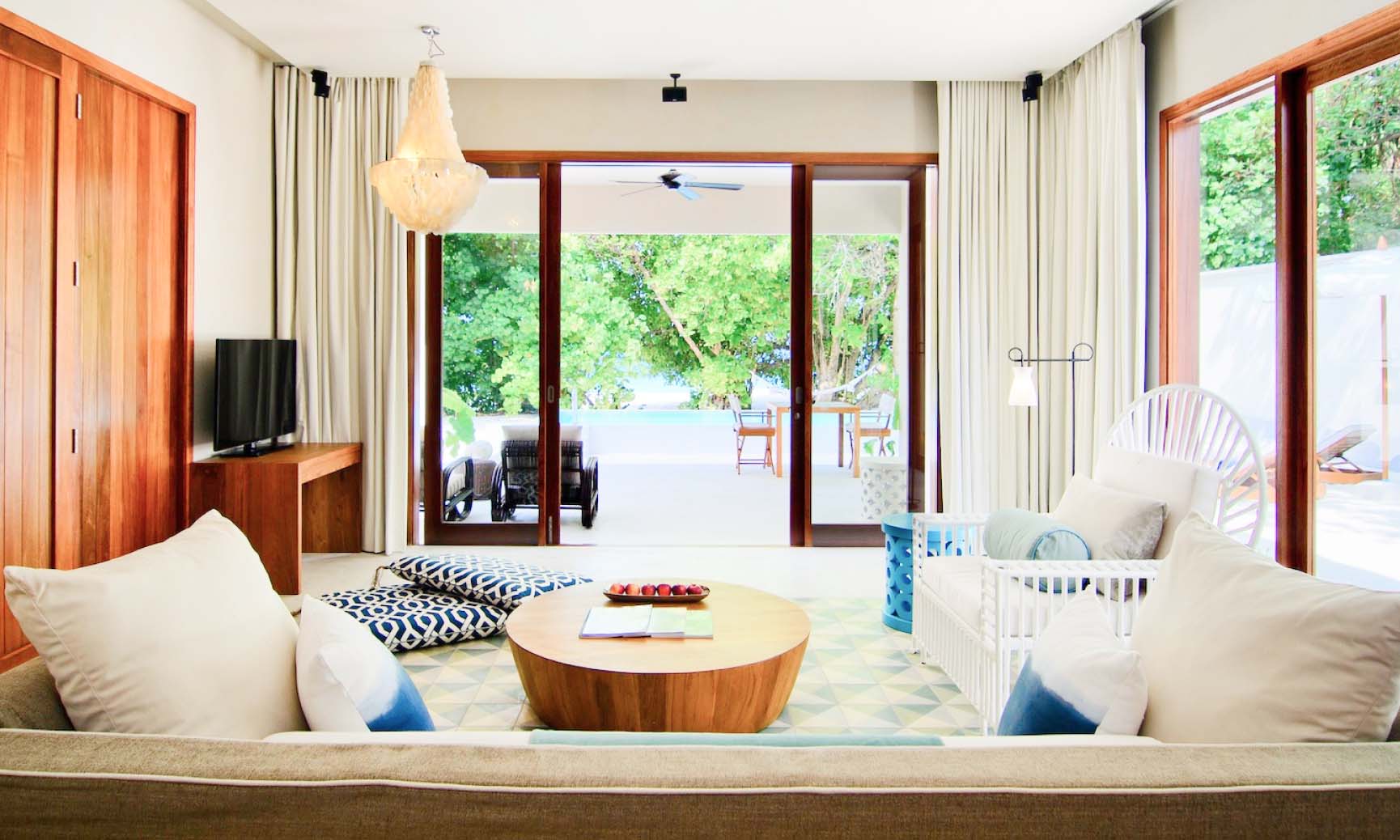 The living room inside of the Maldives Beach Villa with Pool.