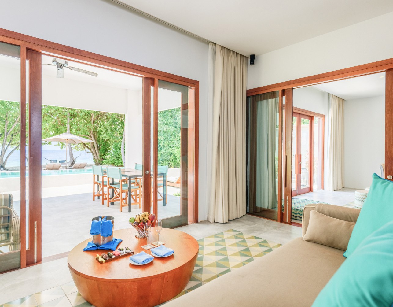 The living room inside of the Maldives Beach Villa with Private Pool.