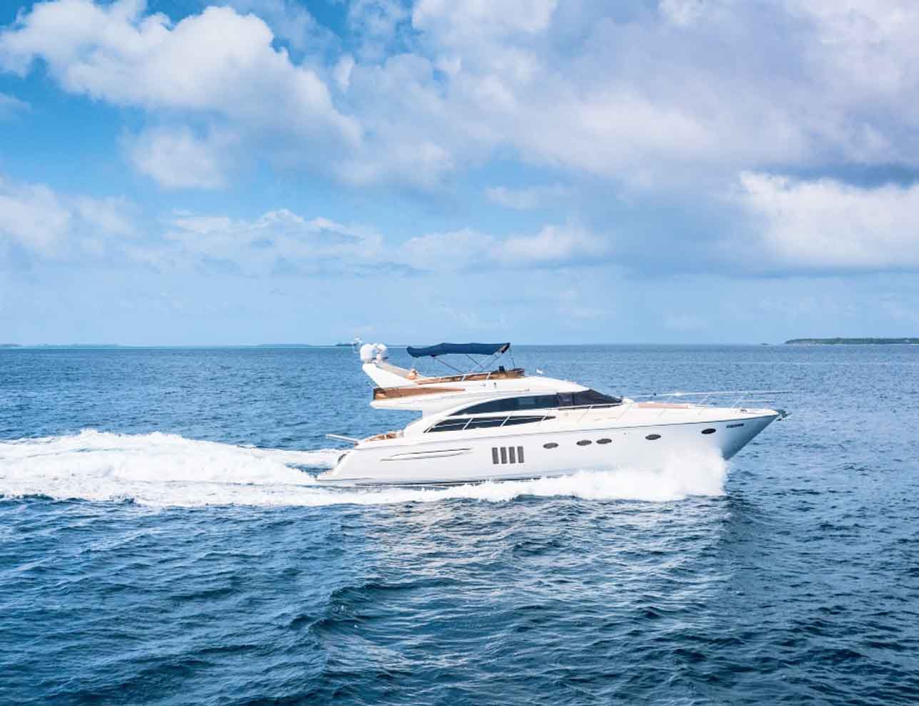 Private Luxury Yacht mooring at Amilla Resort and Residences