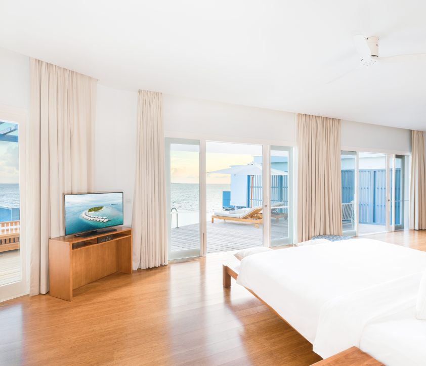 The bedroom view of the sundeck from our 1 bedroom Maldives Lagoon Villa with pool.