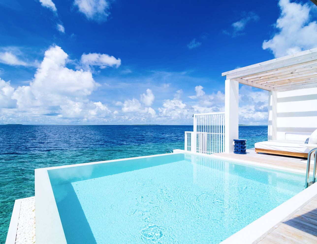 The freshwater pool view and and ocean view from our Maldives Reef Water Villa.
